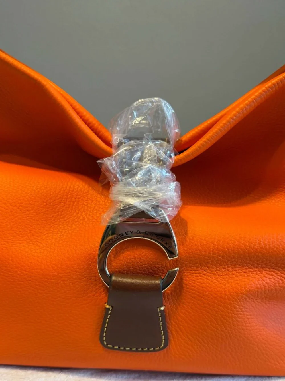 Dooney & Bourke new never